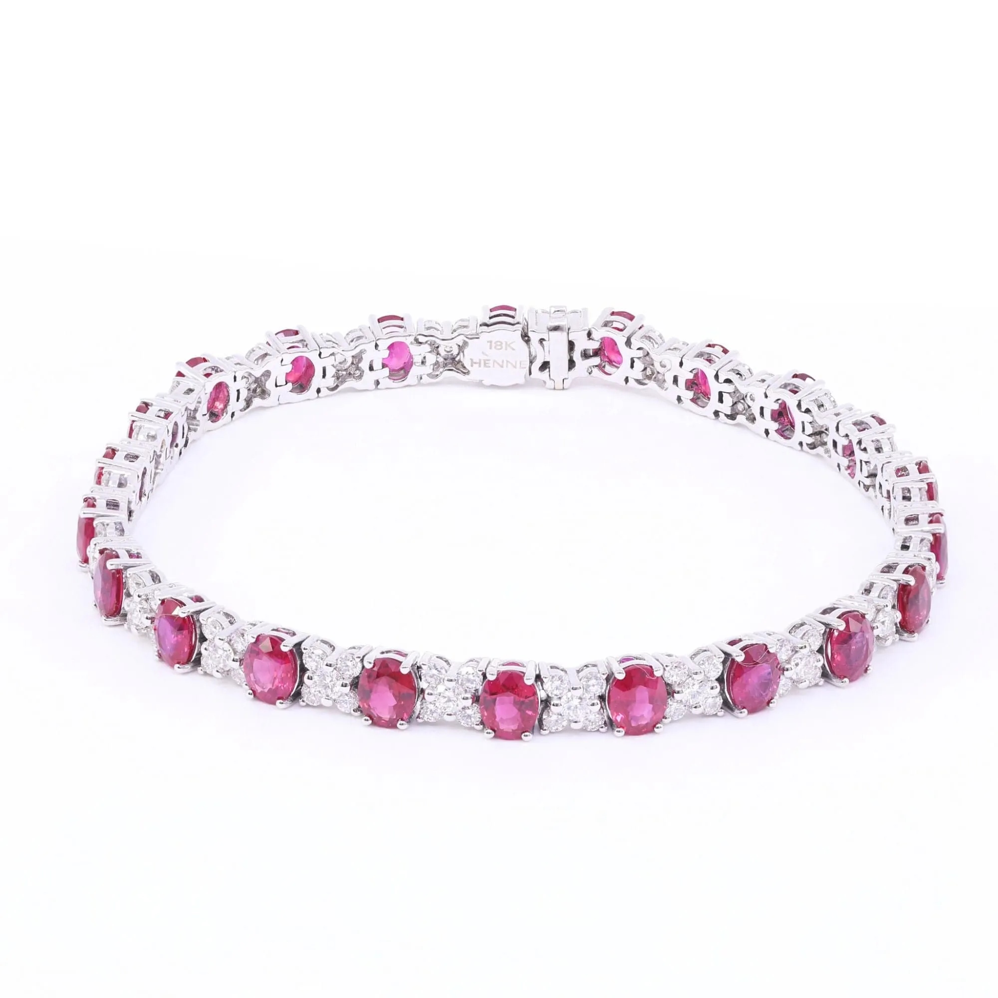 18K WHITE GOLD OVAL RUBY AND ROUND BRILLIANT DIAMOND ALTERNATING BRACELET