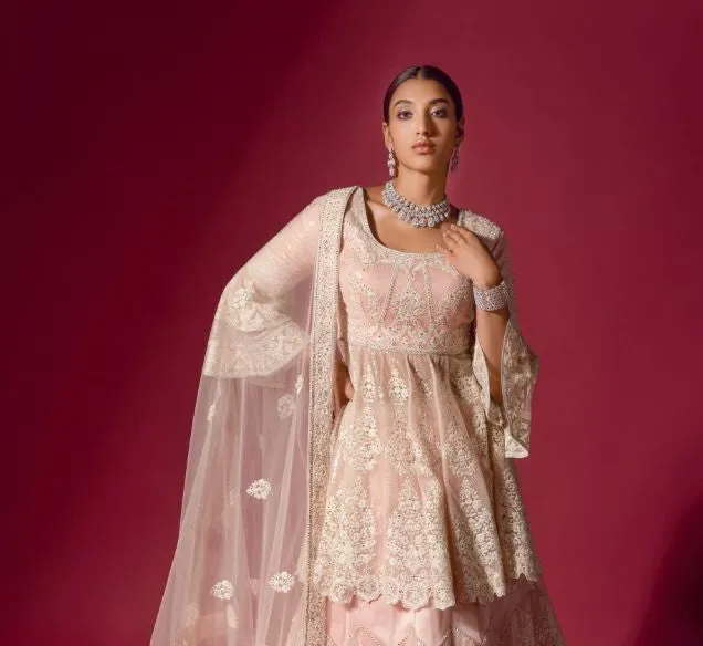 Baby Pink Peplum Jacket Lehenga Set - Rent